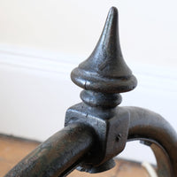Finial on a 1930s Revo Tipton cast iron and copper swan neck street lamp