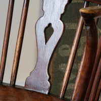Fret work - Antique English Windsor armchair in elm with uneven seat and ash stick back