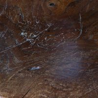 Antique English Windsor armchair in elm with uneven seat and ash stick back