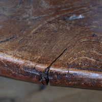 close up of the old timber seat - Antique English Windsor armchair in elm with uneven seat and ash stick back