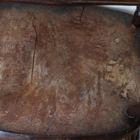 underneath of seat - Antique English Windsor armchair in elm with uneven seat and ash stick back
