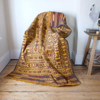 Antique Anatolian kilim rug with saffron ground and geometric motifs