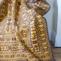 Antique Anatolian kilim rug with saffron ground and geometric motifs