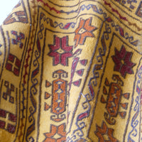 close up of the Antique Anatolian kilim rug with saffron ground and geometric motifs