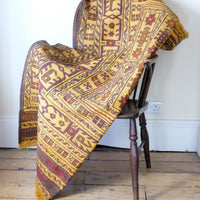 Antique Anatolian kilim rug with saffron ground and geometric motifs