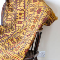 Antique Anatolian kilim rug with saffron ground and geometric motifs