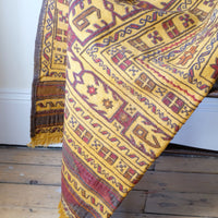 Antique Anatolian kilim rug with saffron ground and geometric motifs