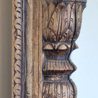 Frame detail on a large antique Indian carved hardwood mirror with Indo-Islamic Moorish arch detail