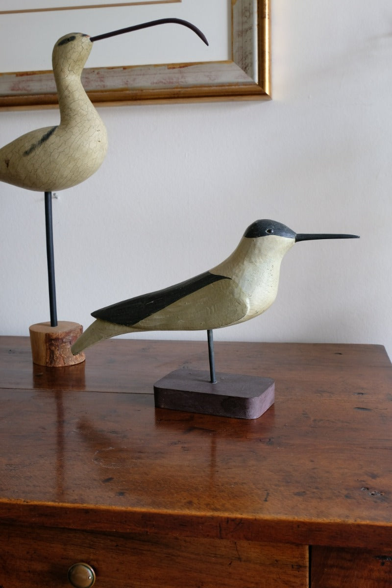 hand carved monochrome painted decorative bird front view