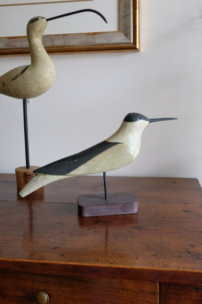 hand carved monochrome painted decorative bird front view