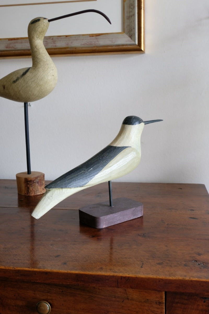 hand carved monochrome painted decorative bird front view