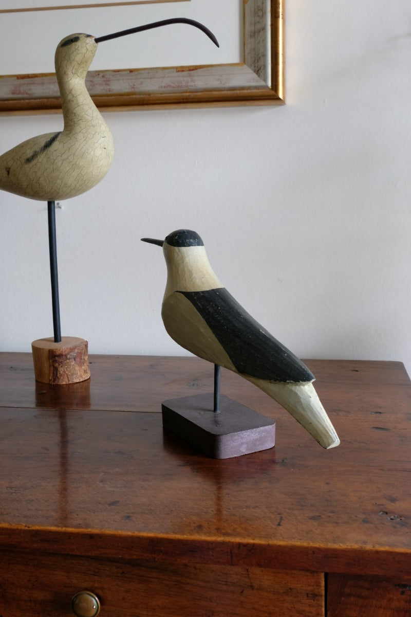 hand carved monochrome painted decorative bird front view
