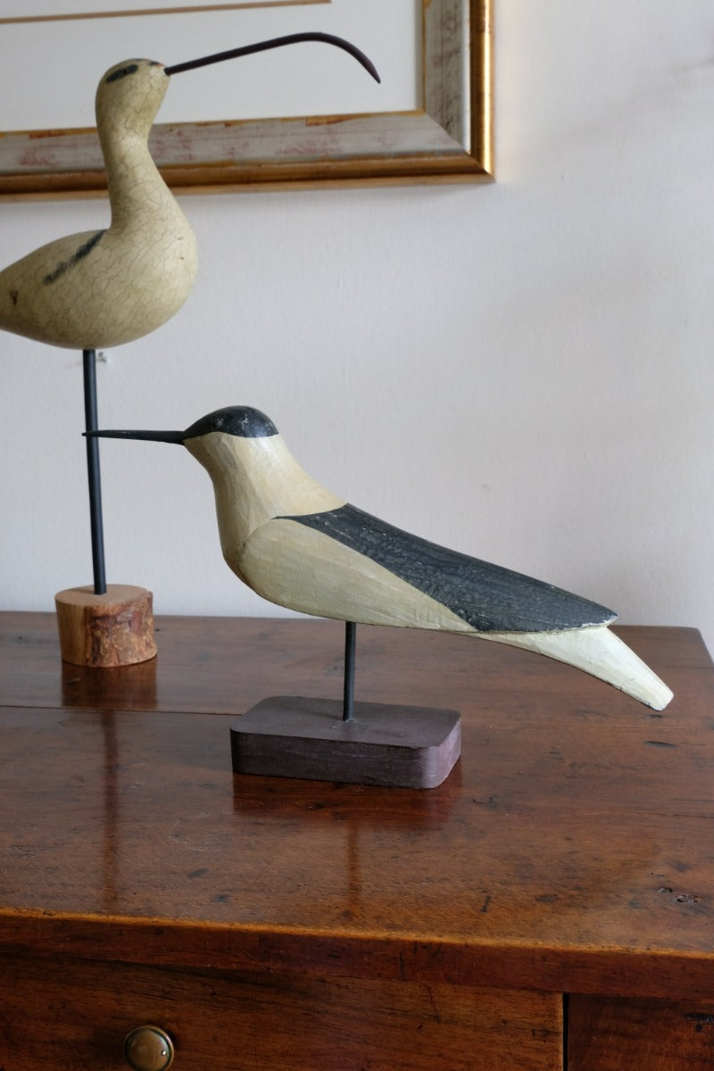 hand carved monochrome painted decorative bird front view