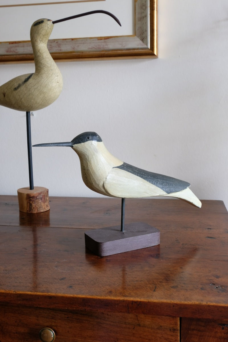hand carved monochrome painted decorative bird front view