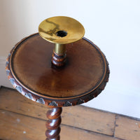 Table top and brass sconce of a Rare Victorian walnut barley twist candle and wine stand with brass candle sconce and carved foliate decoration, circa 1870Rare Victorian walnut barley twist candle and wine stand with brass candle sconce and carved foliate decoration, circa 1870