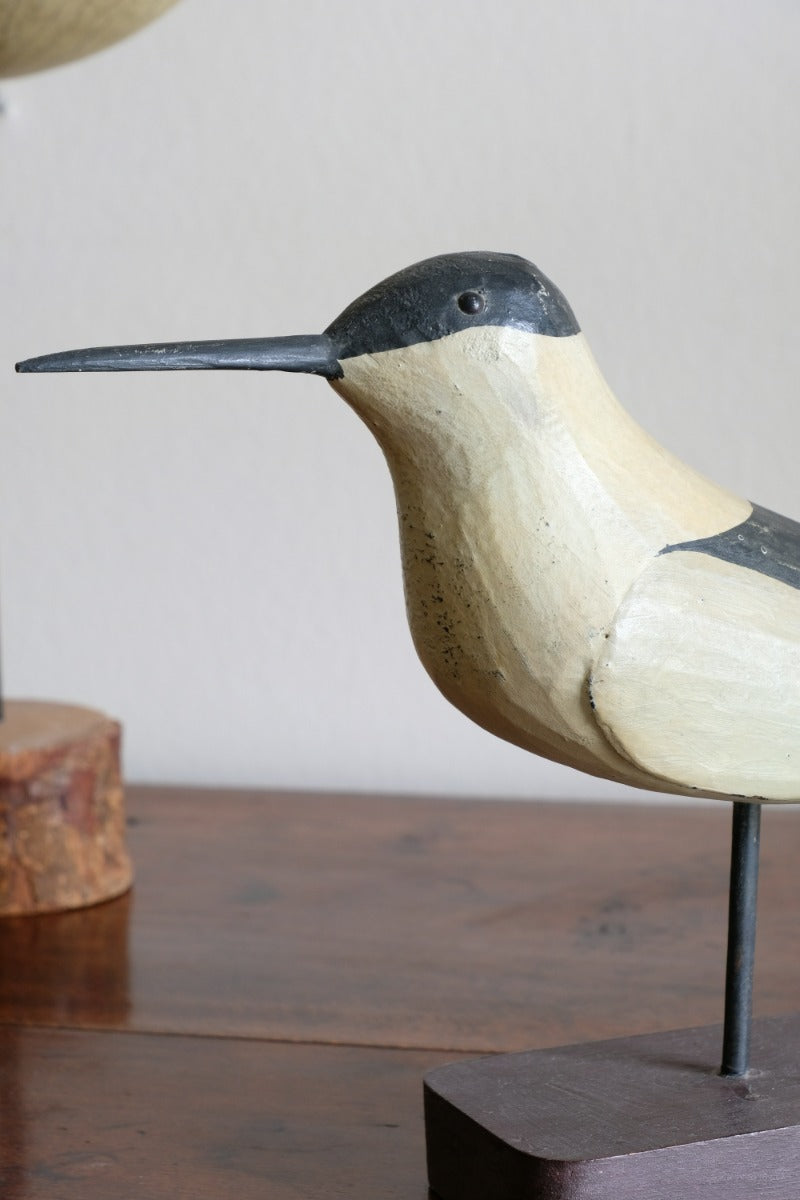 hand carved monochrome painted decorative bird front view