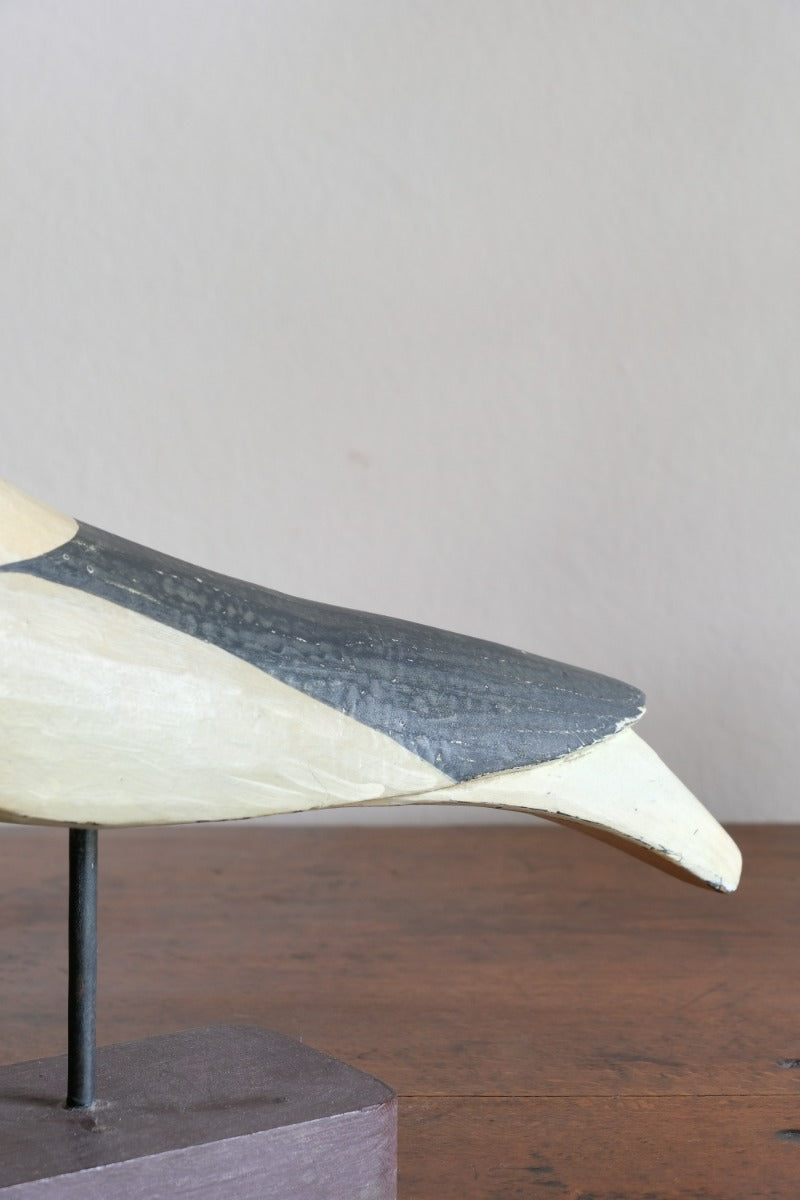 hand carved monochrome painted decorative bird front view