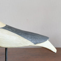 hand carved monochrome painted decorative bird front view