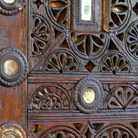 Close up on the relief carved and pierced fretwork decoration -Antique Kutch Damchiya dowry chest with mirror inlay and carved hardwood fretwork, Gujarat c.1900–1930