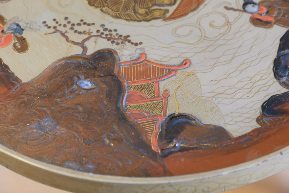 Individual hand‑painted relief landscape scene on Chinoiserie table top