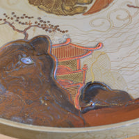 Individual hand‑painted relief landscape scene on Chinoiserie table top