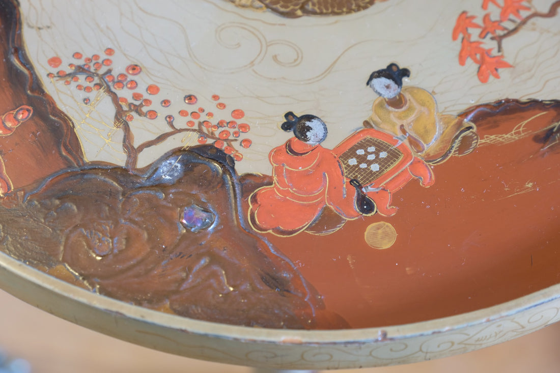 Individual hand‑painted relief landscape scene on Chinoiserie table top