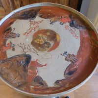 Individual hand‑painted relief landscape scene on Chinoiserie table top