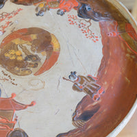 Individual hand‑painted relief landscape scene on Chinoiserie table top