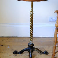 Antique Victorian brass telescopic wine table with mahogany top and lion’s paw feet