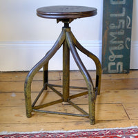 Paint detail on a aged and worn Industrial Swivel Stool Circa 1950 | Vintage Elm & Steel Workshop Stool