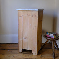 Rear view of a Late Victorian pine marble top bedside cupboard with Carrara marble and concealed brass pivot hinges
