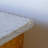 Late Victorian pine marble top bedside cupboard with Carrara marble and concealed brass pivot hinges