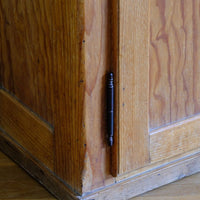 Close up of the brass and steel pin hinges on an Early 20th Century Pitch Pine Single Door Larder Cupboard with Lift-Off Hinges and Original Sprung Latch