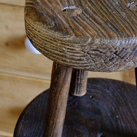 Skin of an Early 20th Century Elm Milking Stool with Thick Weathered Seat and Original Patina