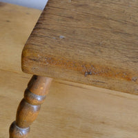 Early 20th Century Oak & Beech Country Stool with Turned Legs showing solid oak seat and turned beech legs