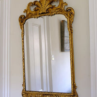 Edwardian Queen Anne Revival carved giltwood wall mirror with Prince of Wales feather crest, c.1900