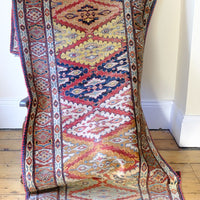 Mid-20th Century North-West Persian ivory ground hand-knotted wool runner with fourteen hooked lozenge medallions