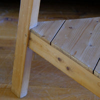 view of the pegged joint on a 19th Century Pine Cricket Supper Table for Two with Triangular Under-Tier Shelf