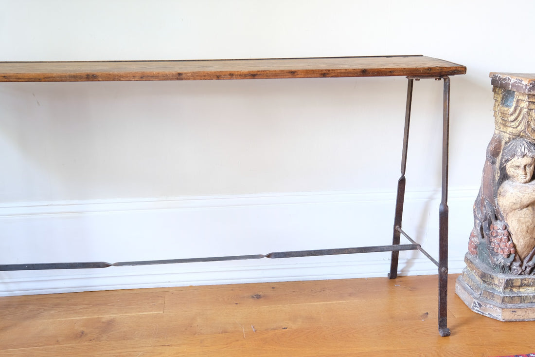 Industrial hallway console table with iron frame and bolted plank top