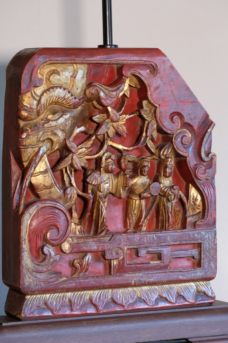 close‑up carved elephant oriental lamp detail