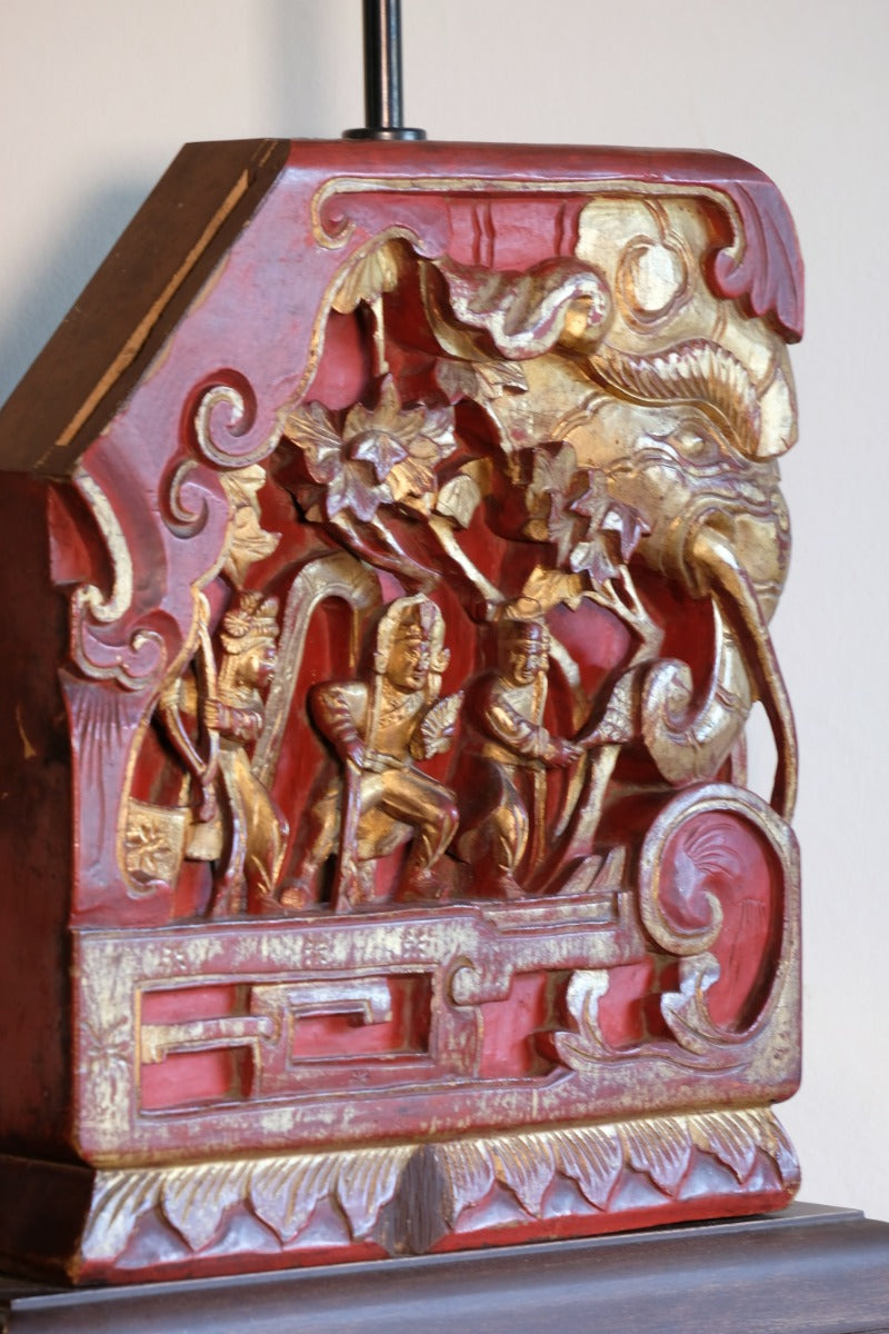 close‑up carved elephant oriental lamp detail