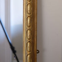 a continuous carved giltwood guilloche border of elongated oval reserves on the Mid-19th Century Giltwood Pier and Overmantel Mirror by John Westley Birmingham