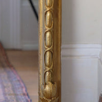 a continuous carved giltwood guilloche border of elongated oval reserves on the Mid-19th Century Giltwood Pier and Overmantel Mirror by John Westley Birmingham