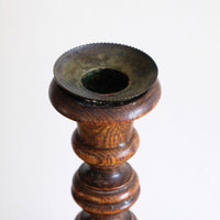 Pair of tall antique oak open barley twist candlesticks with original brass sconces and weighted circular bases