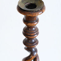 Pair of tall antique oak open barley twist candlesticks with original brass sconces and weighted circular bases