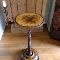 Mid-Victorian burr walnut candle stand with fixed candle arm and barley-twist column