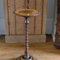 Mid-Victorian burr walnut candle stand with fixed candle arm and barley-twist column
