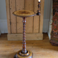 Mid-Victorian burr walnut candle stand with fixed candle arm and barley-twist column