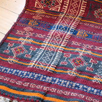 Monumental mid-20th century Moroccan Berber flatweave rug with red and indigo geometric patterns