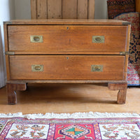 Early to mid-19th century mahogany two-drawer campaign chest viewed from the front
